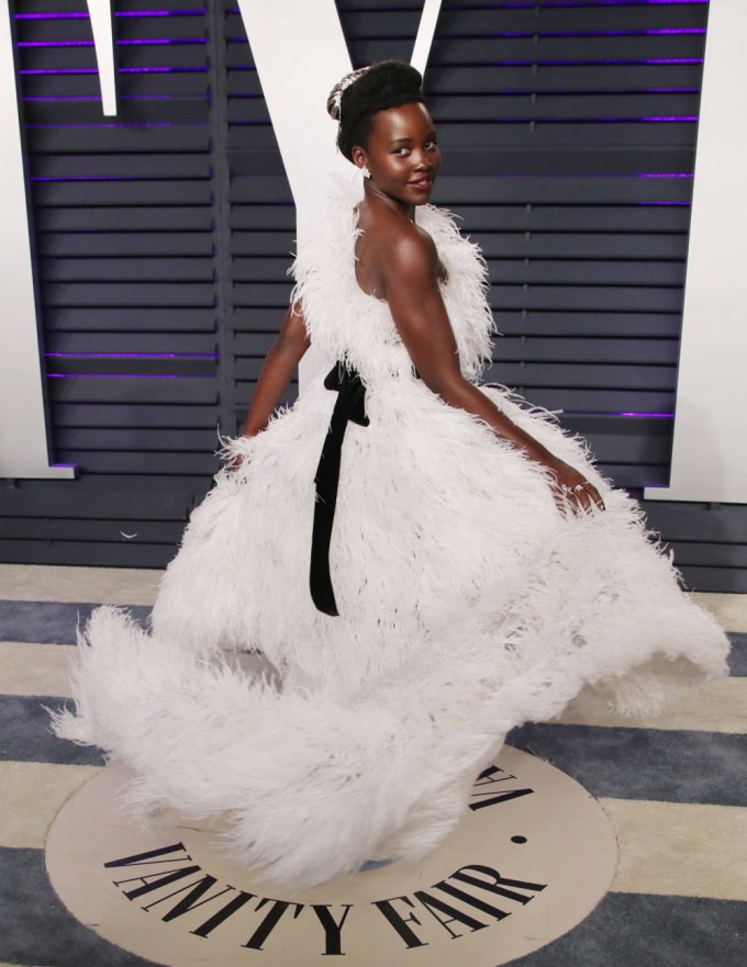 Lupita Nyong’o Wearing An Oscar De La Renta Gown