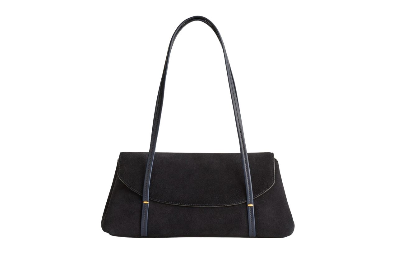 A rectangular handbag with a foldover top and thin shoulder straps named the Madewell Lexington Handbag Credit: Madewell