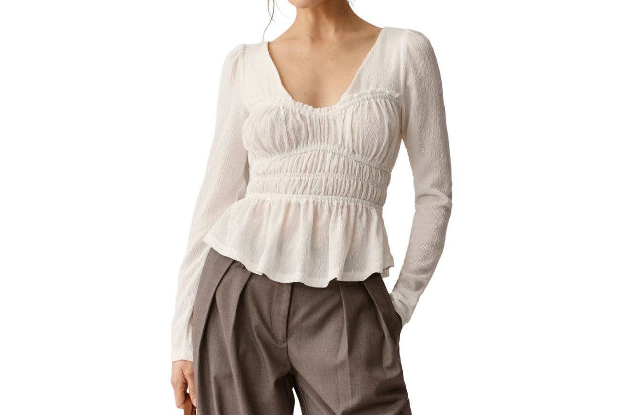 Maeve Long-Sleeve Smocked Top Credit: Anthropologie