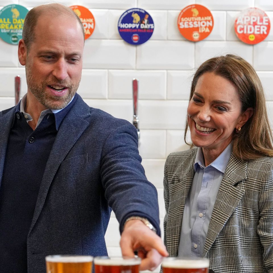 Britain's Prince William, Prince of Wales and Britain's Catherine, Princess of Wales, smile during a visit to the Southwark Brewing Company Prince William and Kate Middleton.Credit: Kin Cheung / POOL / AFP via Getty