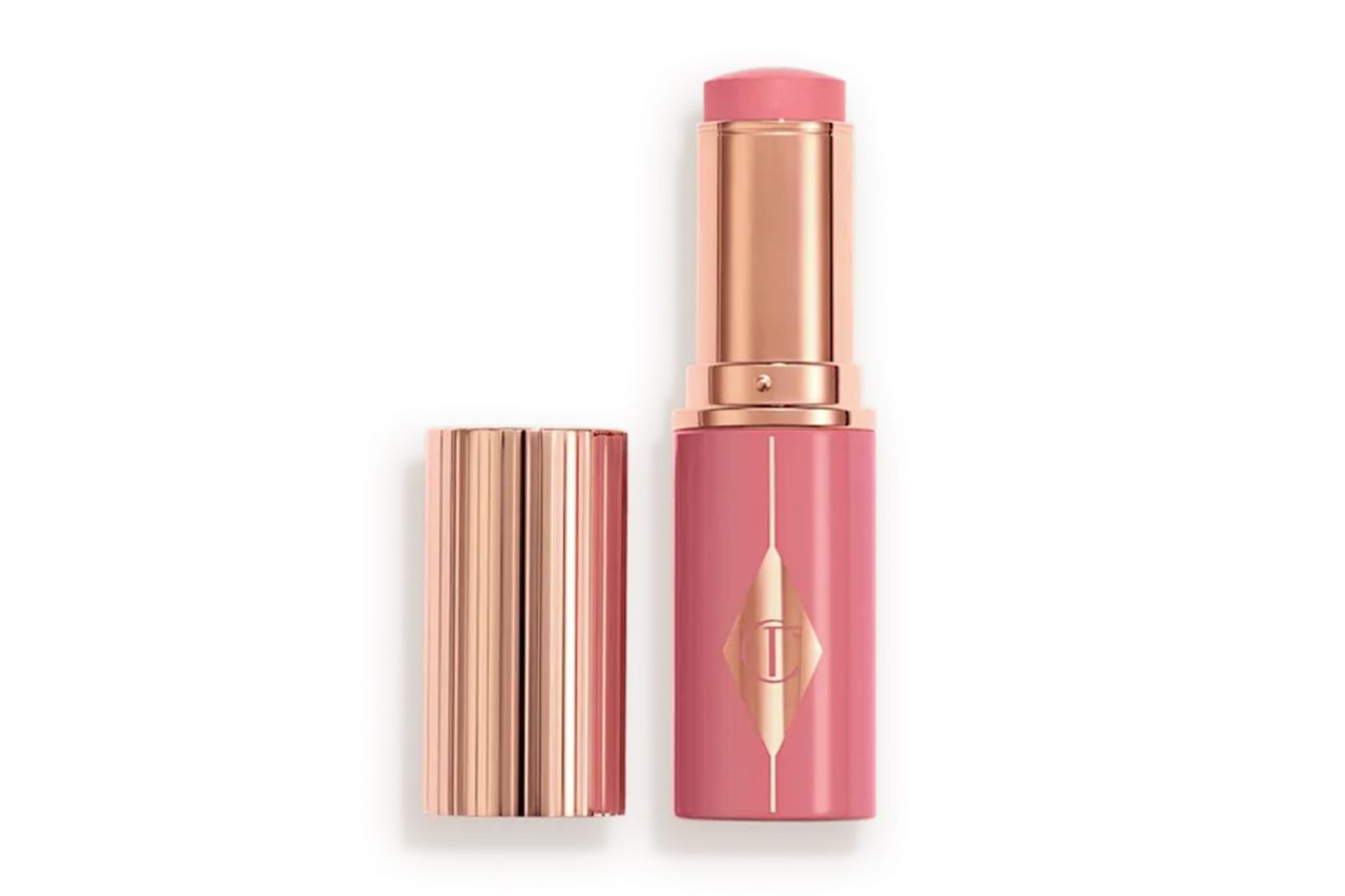 A blush stick with its cap removed featuring a glossy casing and a softcolored tip Credit: Charlotte Tilbury