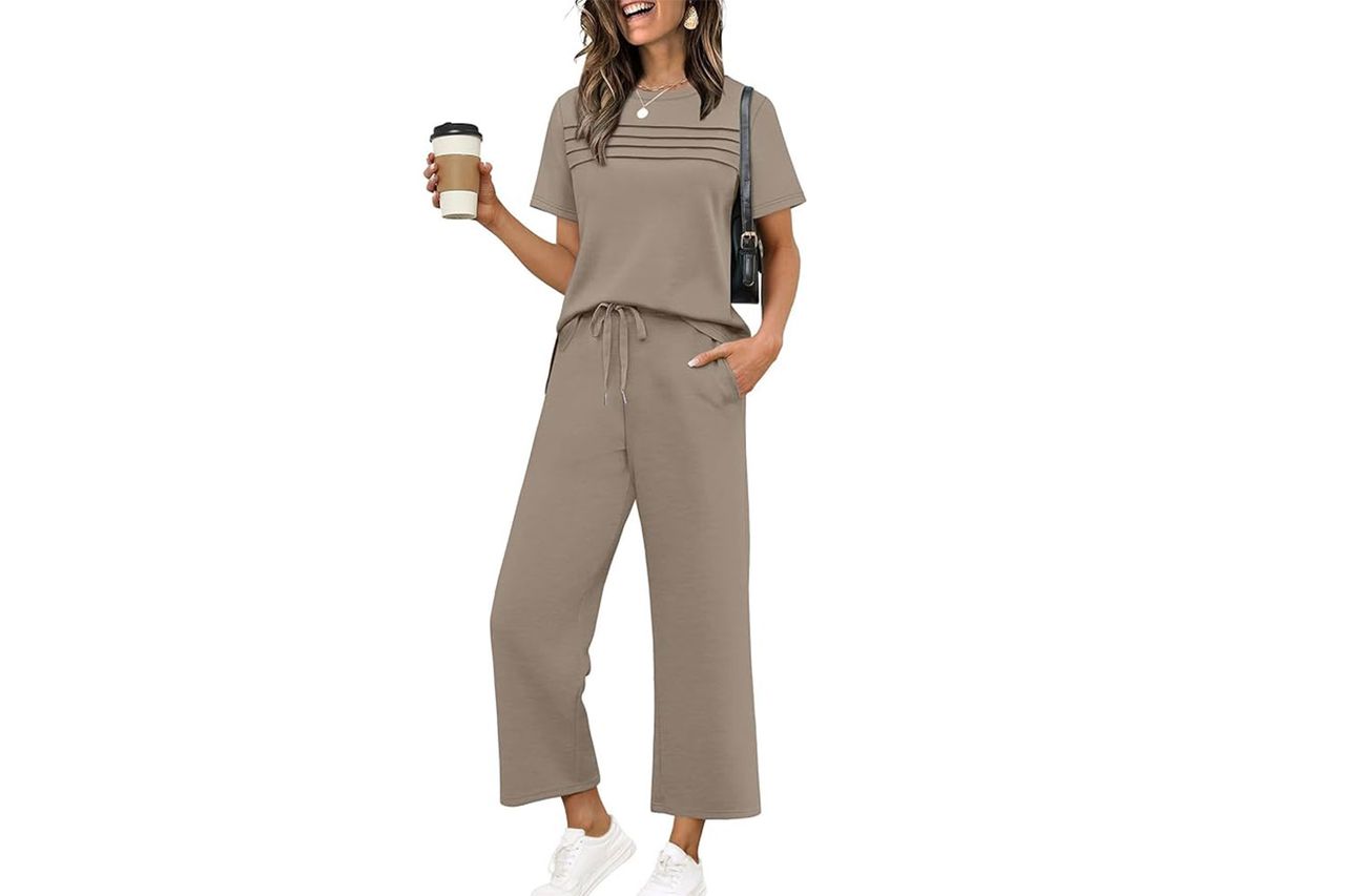 A person wearing a twopiece casual outfit and holding a togo coffee cup Credit: Amazon