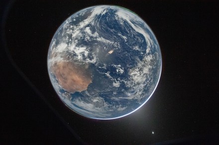 Artemis 2 Photos: Pictures of the Moon, Earthset, Eclipse & More a view of Earth taken by NASA astronaut and Artemis II commander Reid Wiseman from the Orion spacecraft's window after completing the translunar injection burn on April 2, 2026.