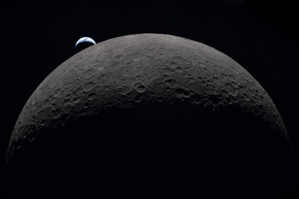 Artemis 2 Photos: Pictures of the Moon, Earthset, Eclipse & More Earth sets at 6:41 p.m. EDT, April 6, 2026, over the Moon’s curved limb in this photo captured by the Artemis II crew during their journey around the far side of the Moon.