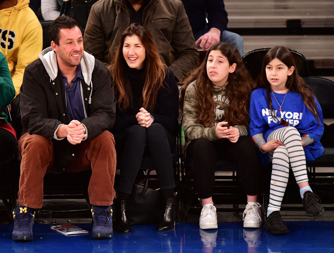 Adam Sandler, Jackie Sandler, Sadie Sandler and Sunny Sandler attend Milwaukee Bucks v New York Knicks game at Madison Square Garden on December 25, 2018 in New York City The Sandler family at a 2018 New York Knicks gameCredit: James Devaney/Getty