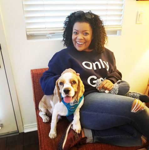 Yvette Nicole Brown and dog Yvette Nicole Brown smiles while sitting next to her dog Mister Harley BrownCredit: Mister Harley Brown Instagram