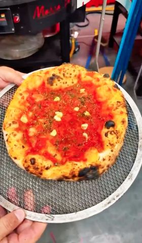 Loredana Passariello Florida Attorney Turned Restaurant Owner Wins International Pizza Passariello made a margherita pizza for the competitionCredit: La Leggenda Pizzeria/Instagram