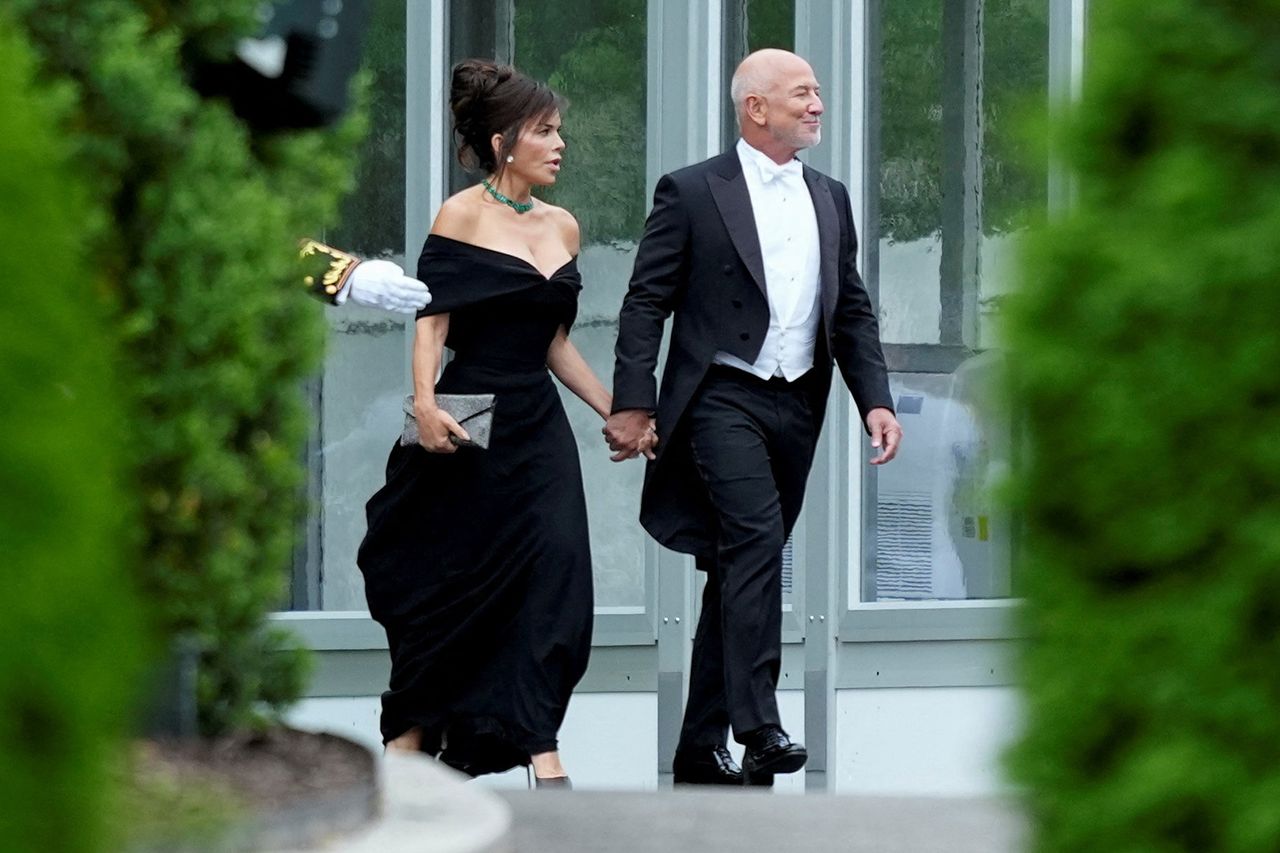 Lauren Sanchez Bezos and Jeff Bezos arrive to attend a state dinner at the White House on April 28, 2026.Credit: REUTERS/Ken Cedeno