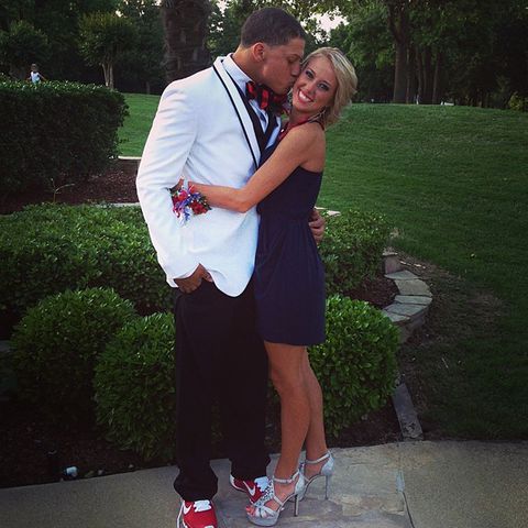 Patrick Mahomes kisses Brittany Mahomes on the cheek before prom in May 2014Credit: Brittany Mahomes/Instagram