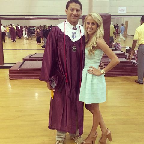 Patrick Mahomes and Brittany Mahomes pose for a photo at his high school graduation in May 2014Credit: Brittany Mahomes/Instagram
