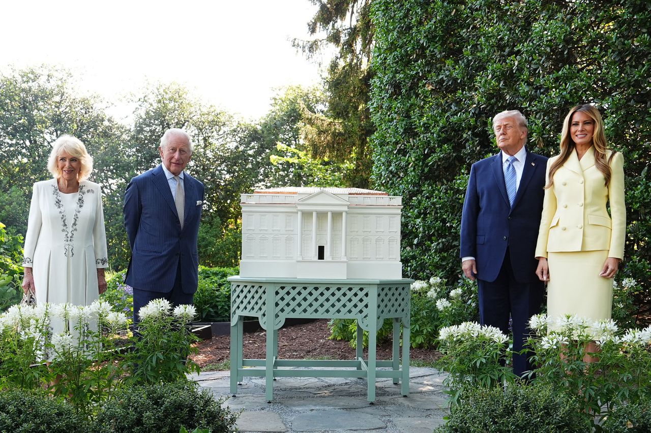 Queen Camila, King Charles, President Donald Trump and first lady Melania Trump post next to the White House beehive in the South Lawn on April 27, 2026Credit: Aaron Chown / POOL / AFP/Getty