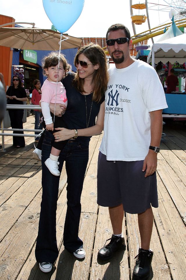 Actor Adam Sandler, Jackie Sandler and baby Sadie Madison Sandler arrive at the Kinerase Skincare Celebration on the Pier hosted by Courteney Cox to benefit the EV Medical Research Foundation on September 29, 2007 Adam, Jackie and Sadie Sandler in 2007Credit: Frazer Harrison/Getty