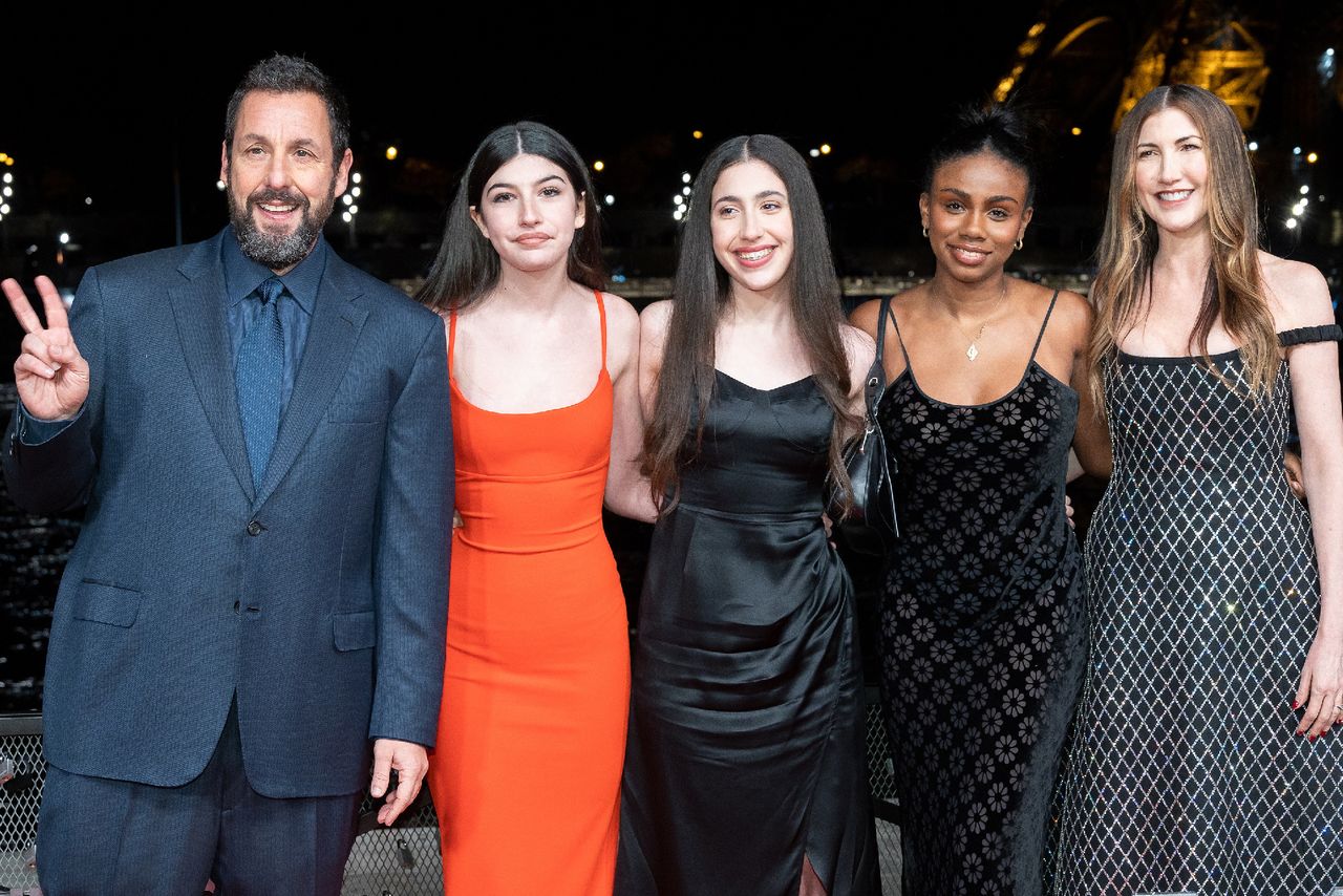 Adam Sandler, Sunny Sandler, Sadie Madison Sandler, guest and Jackie Sandler The Sandler family at the 2023 premiere of Murder Mystery 2Credit: Marc Piasecki/WireImage