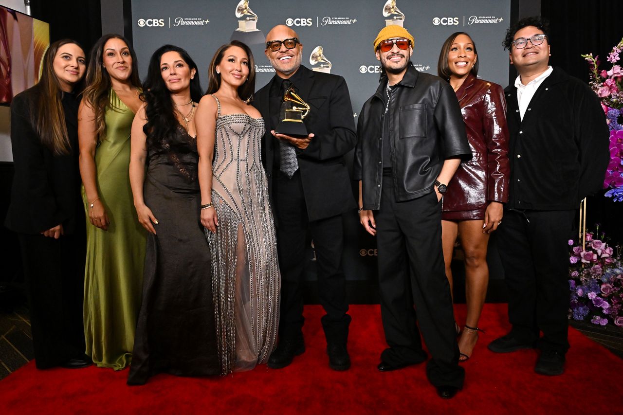 Adrienne Bailon-Houghton and Israel Houghton (both middle) with others at the 2026 Grammy AwardsCredit: Michael Buckner/Billboard via Getty