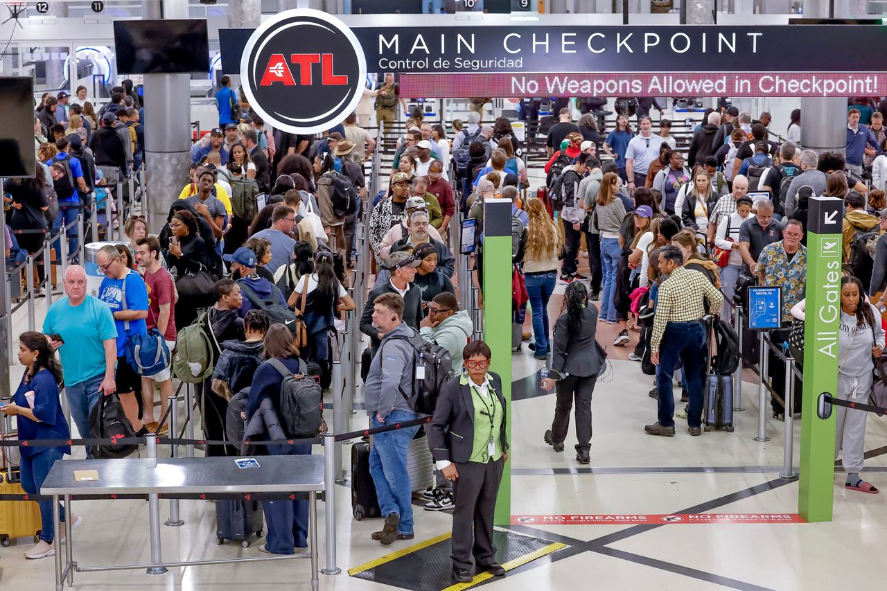 TSA security screening checkpoint lines inside the domestic terminal at Hartsfield-Jackson Atlanta International Airport in Atlanta, Georgia Travelers wait in line for security at Hartsfield-Jackson Atlanta International Airport on March 23.Credit: ERIK S LESSER/EPA/Shutterstock