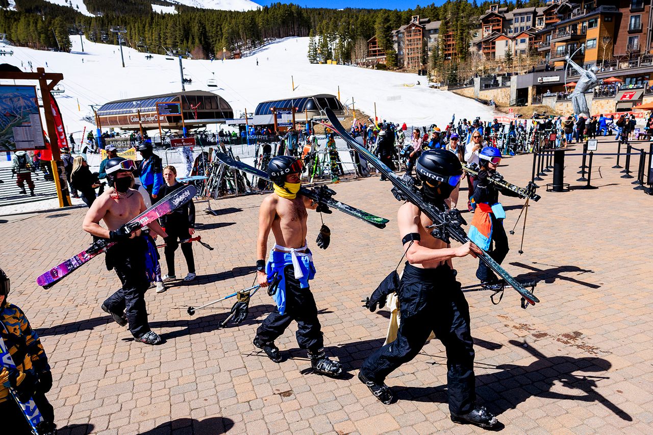 A group of friends finish their last ski run without their shirts on at Breckenridge Ski Resort as temperatures reach into the 50s on March 18, 2026 in Breckenridge, Colorado. group of friends finish their last ski run without their shirts on in Breckenridge, Colorado as temperatures reach into the 50s on March 18, 2026.Credit: Michael Ciaglo/Getty