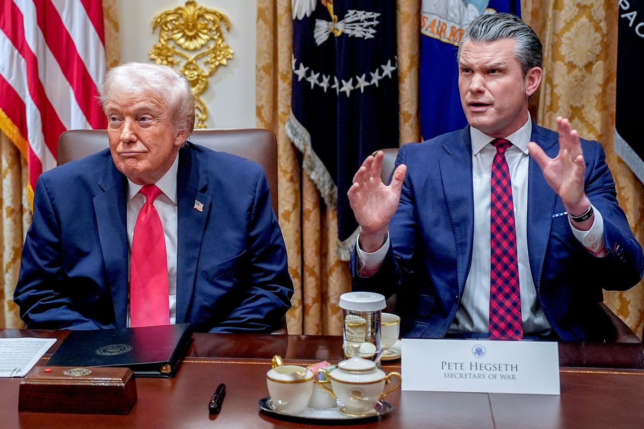 President Donald Trump and Defense Secretary Pete Hegseth at a Cabinet meeting on Dec. 2, 2025Credit: Yuri Gripas/CNP/Bloomberg via Getty