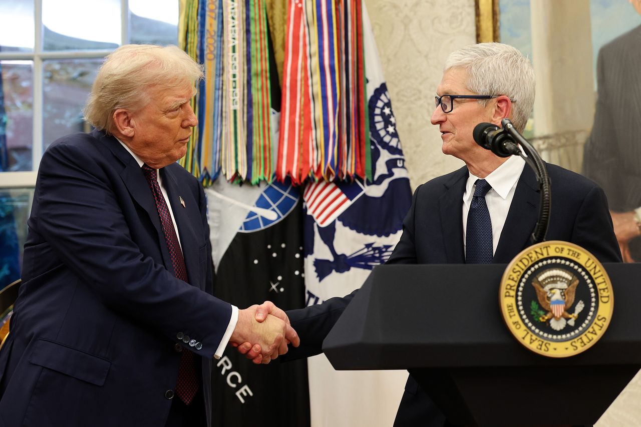 President Donald Trump and Tim Cook on August 6, 2025 in Washington, DC.Credit: Win McNamee/Getty