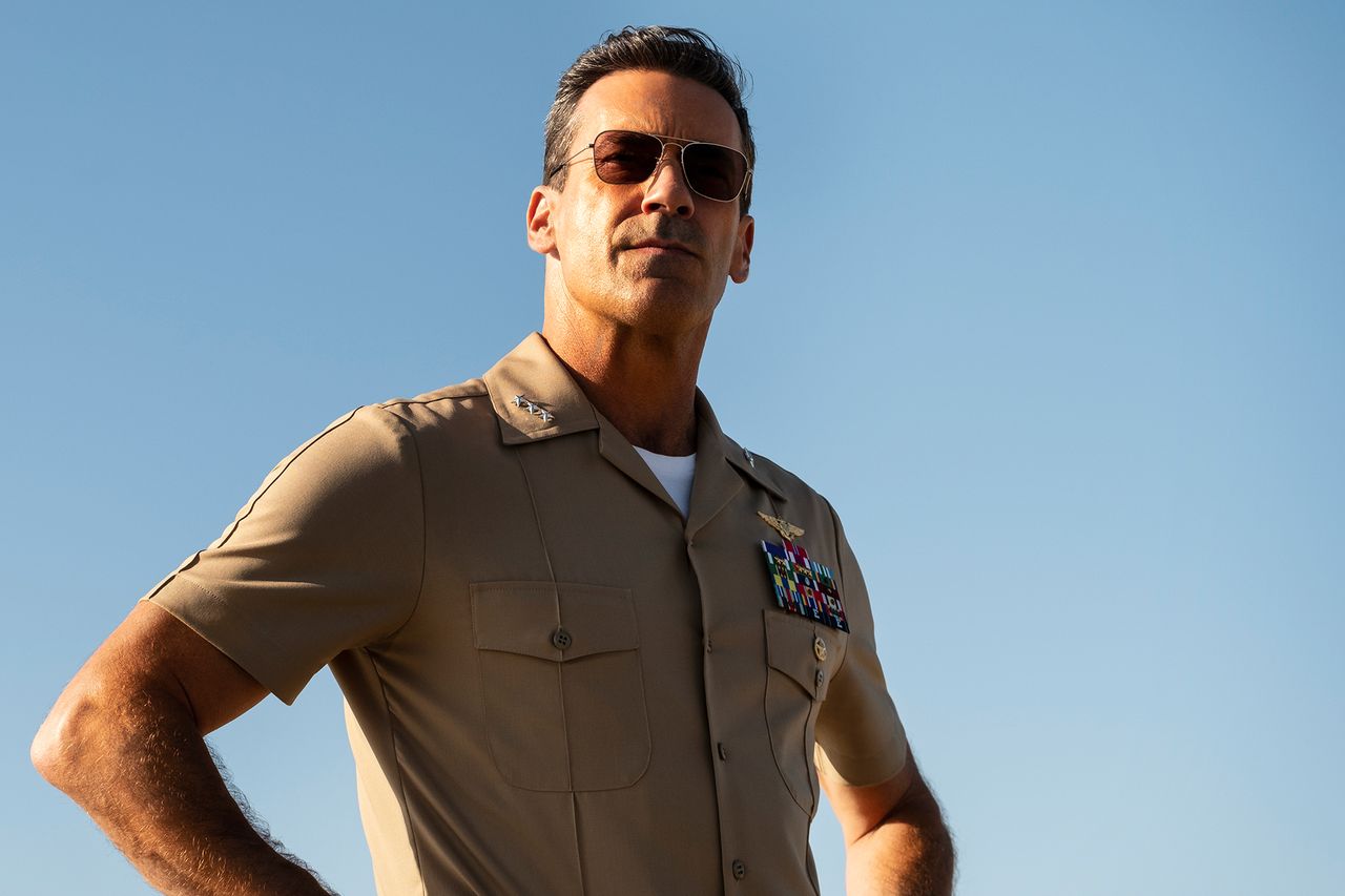 A person wearing a military uniform with hands on hips photographed against a clear blue sky Jon Hamm in ‘Top Gun: Maverick’ (2022)Credit: Paramount Pictures