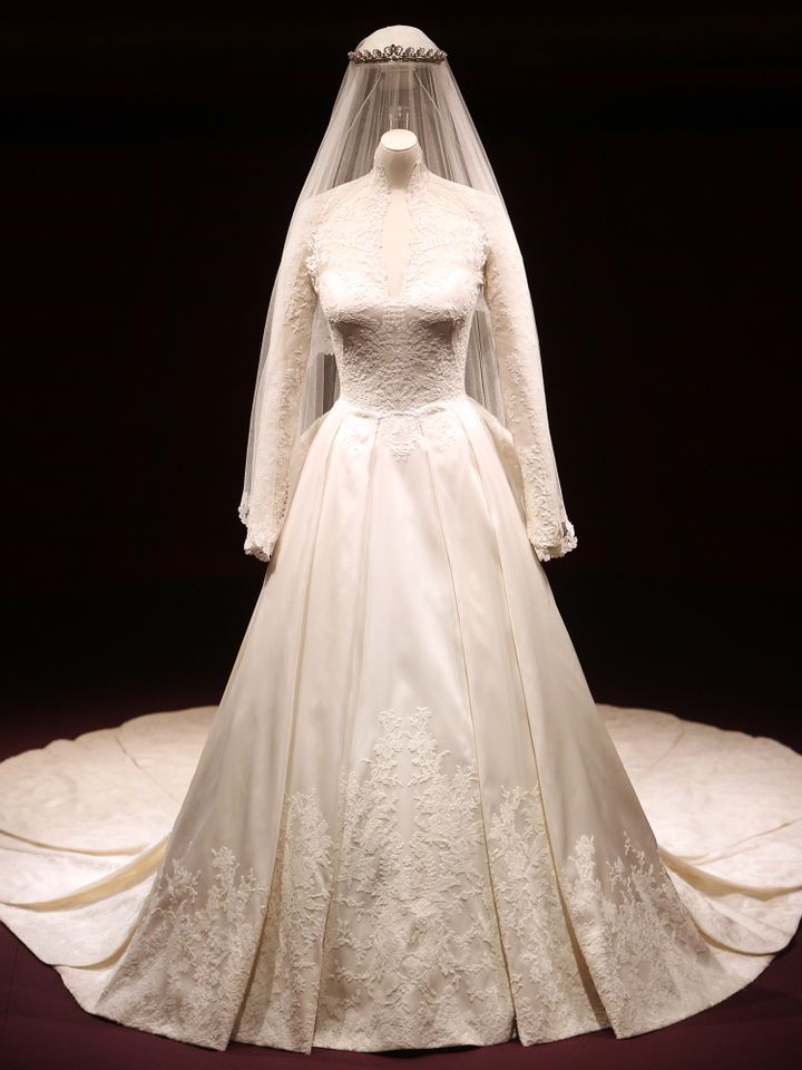 A detail of the Duchess of Cambridge's wedding dress, designed by Sarah Burton for Alexander McQueen, is photographed before it goes on display at Buckingham Palace during the annual summer opening on July 20, 2011 in London, England.Credit: Lewis Whyld/WPA Pool/ Getty