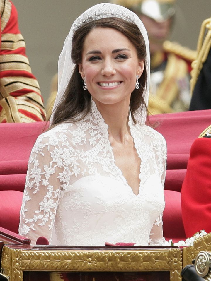 Catherine, Duchess of Cambridge travels down The Mall on route to Buckingham Palace in a horse drawn carriage following her wedding at Westminster Abbey on April 29, 2011 in London, England.Credit: Indigo/Getty