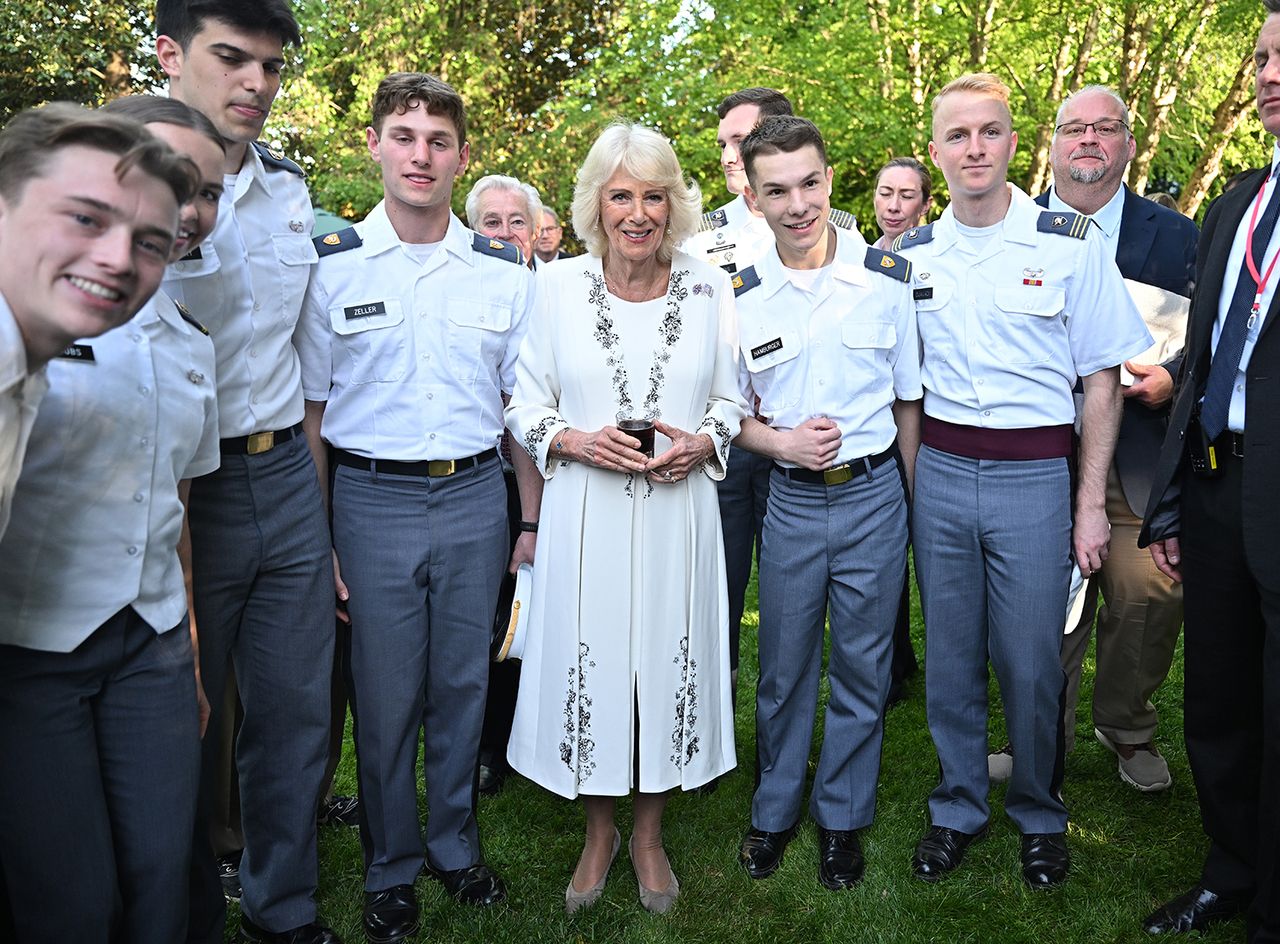 Queen Camilla poses with West Point cadets at a garden party held at the British embassy on April 27, 2026Credit: Samir Hussein/WireImage