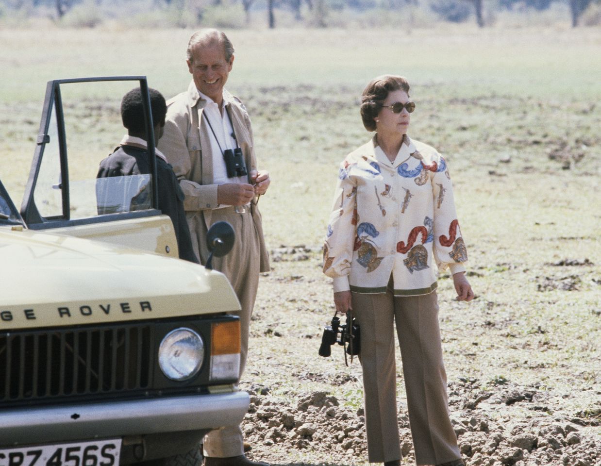 Prince Philip and Queen Elizabeth are pictured on a safari during a state visit to Zambia in 1979Credit: Serge Lemoine/Getty