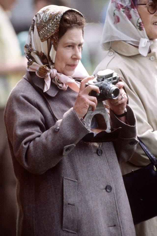 Queen Elizabeth takes photos at the Windsor Horse Show in Windsor, England, on May 15, 1981Credit: Tim Graham Photo Library