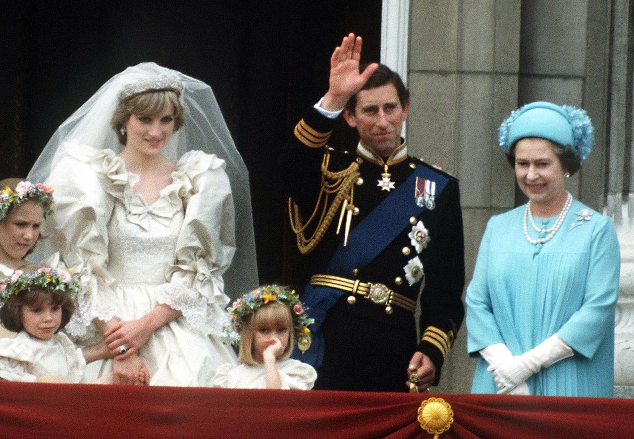 Princess Diana, then-Prince Charles and Queen Elizabeth appear on the balcony of Buckingham Palace on the Prince and Princess of Wales' wedding day on July 29, 1981Credit: Terry Fincher/Princess Diana Archive/Getty