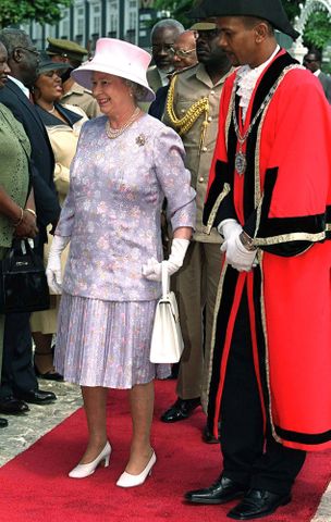 Queen Elizabeth visits Sam Sharpe Square during her visit to Montego Bay, Jamaica, on Feb. 20, 2002Credit: Julian Parker/UK Press/Getty
