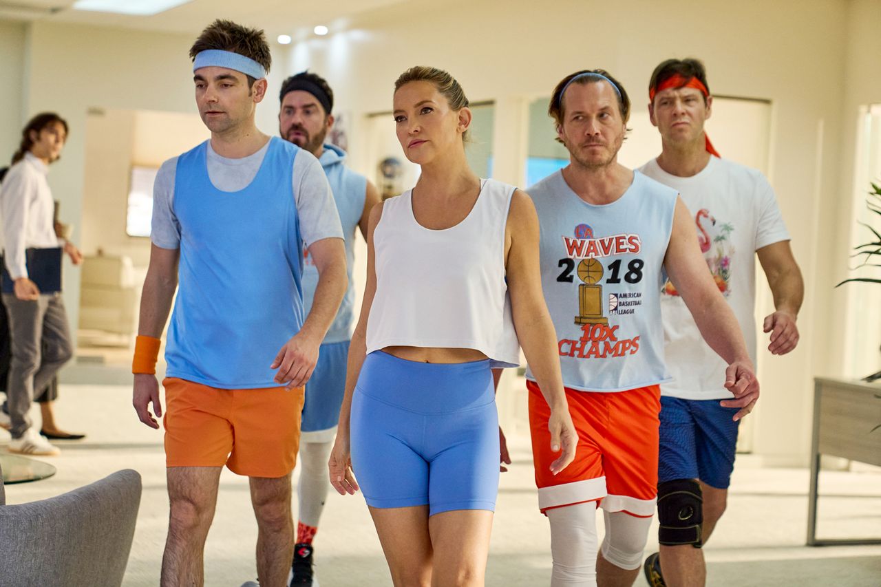 Drew Tarver as Sandy Gordon, Justin Theroux as Cam Gordon, Kate Hudson as Isla Gordon, Scott MacArthur as Ness Gordon, and Ike Barinholtz as Cousin Bennie in Episode 208 of Running Point Season 2.Credit: Katrina Marcinowski/Netflix
