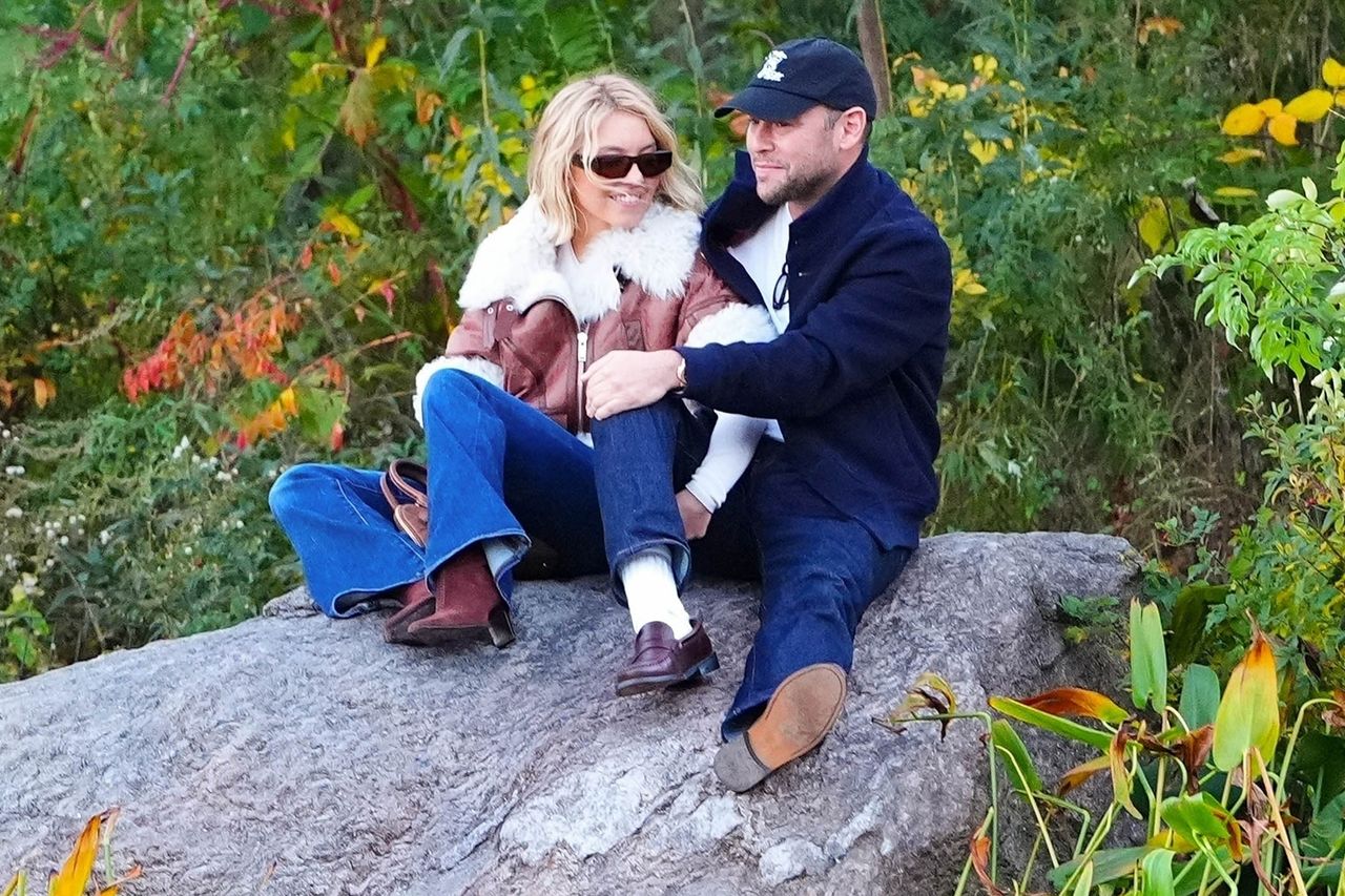 Actress Sydney Sweeney locks lips with her new boyfriend Scooter Braun on a rock overlooking a lake during a romantic outing at beautiful Central Park in New York. Sydney Sweeney and Scooter Braun in November 2025Credit: BACKGRID