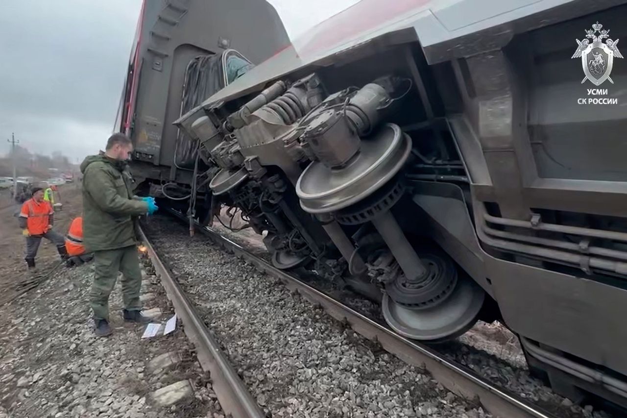 In this image from video provided by the Investigative Committee of Russia, investigators work at the site of a passenger train derailment site near Bryandino village, Ulyanovsk region, Russia Train derailment in RussiaCredit: Investigative Committee of Russia via AP