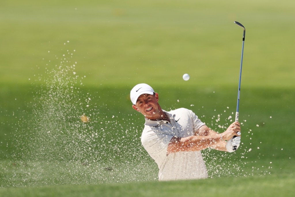 AUGUSTA, GEORGIA - APRIL 08: Rory McIlroy of Northern Ireland plays a shot from a bunker in the practice area during a practice round prior to the 2025 Masters Tournament at Augusta National Golf Club on April 08, 2025 in Augusta, Georgia. (Photo by Richard Heathcote/Getty Images)