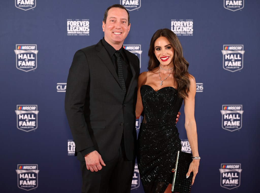 CHARLOTTE, NORTH CAROLINA - JANUARY 23: NASCAR Cup Series driver, Kyle Busch and wife, Samantha Busch pose for photos on the red carpet prior to the NASCAR Hall of Fame Induction Ceremony at Charlotte Convention Center on January 23, 2026 in Charlotte, North Carolina. (Photo by David Jensen/Getty Images)