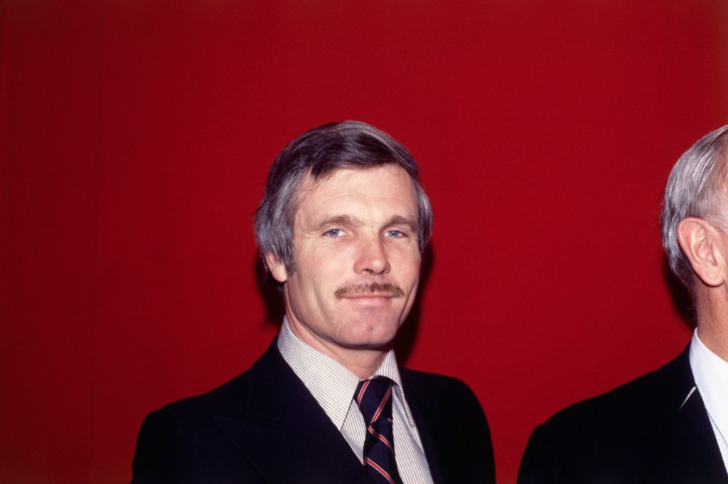 Avid sports fan and media mogul Ted Turner, who would go on to launch CNN and the Turner Network Television, gives a youthful smile.