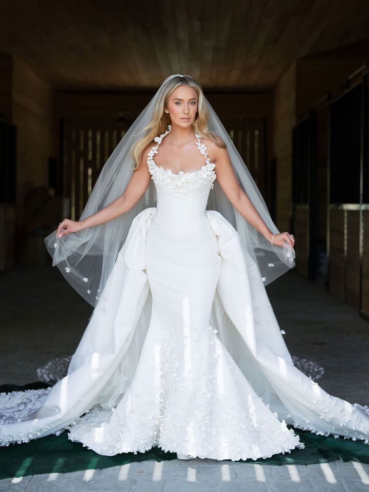 Lainey Wilson Wears a Dress for the ‘First Time’ to Walk Down the Aisle at Wedding with Devlin ‘Duck’ HodgesCredit: Corbin Gurkin