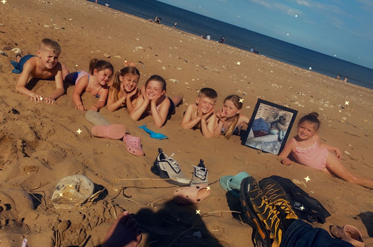 Some of Louise Temple's children on the beach.Credit: Kennedy News and Media
