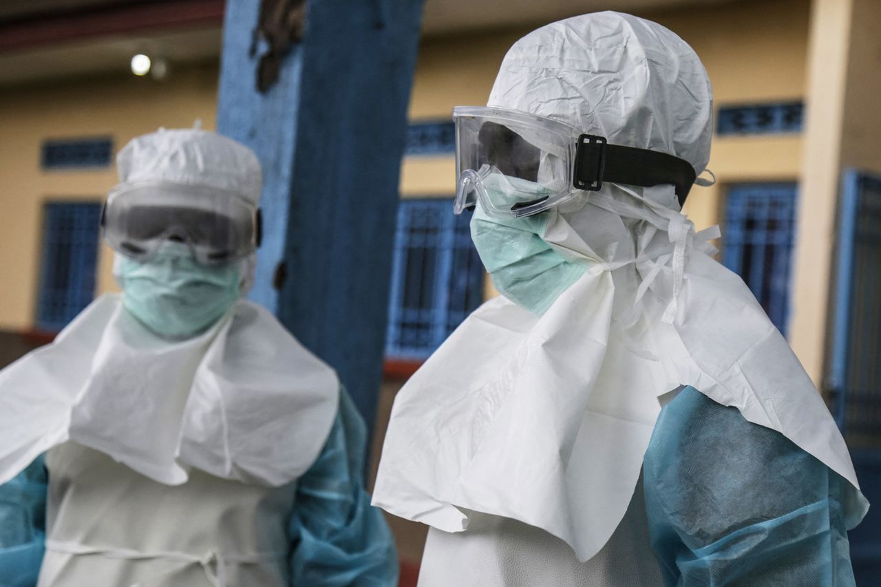 Medical staff wears personal protective equipmentCredit: Seros MUYISA / AFP via Getty