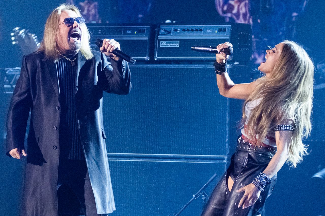 Carrie Underwood with Motley Crue Vince Neil of Mötley Crüe and Carrie Underwood on American IdolCredit: Disney/Eric McCandless