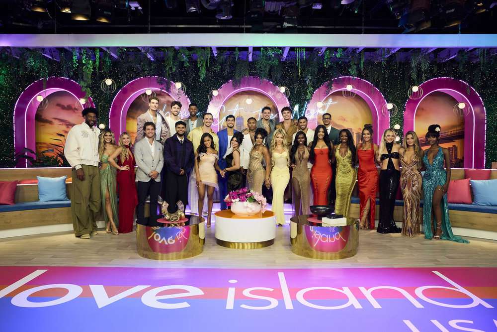 LOVE ISLAND USA -- Season: 7 -- Pictured: (l-r top row) Austin Shepard, Zac Woodworth, JD Dodard, Elan Bibas, Charlie Georgiou, Taylor Williams, Jose "Pepe" Garcia-Gonzalez, Nicolas Nic Vansteenberghe, Jeremiah Brown, Ace Greene, (bottom row) Chris Seeley, Isabelle Belle-A Walker, Hannah Fields, Thomas John "TJ" Palma, Bryan Arenales, Amaya Espinal, Huda Mustafa, Clarke Carraway, Savanna "Vanna" Einerson, Olandria Carthen, Andreina Santos, Michelle Chelley Bissainthe, Jaden Dugger, Gracyn Blackmore, Iris Kendall, Cortney "CoCo" Watson -- (Photo by: Jocelyn Prescod/Peacock)