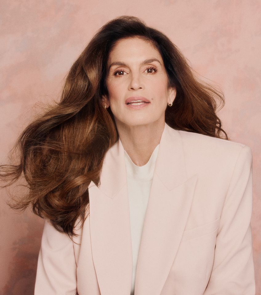 Cindy Crawford posing against a neutral background gazing directly forward Cindy Crawford for UpneeqCredit: Upneeq