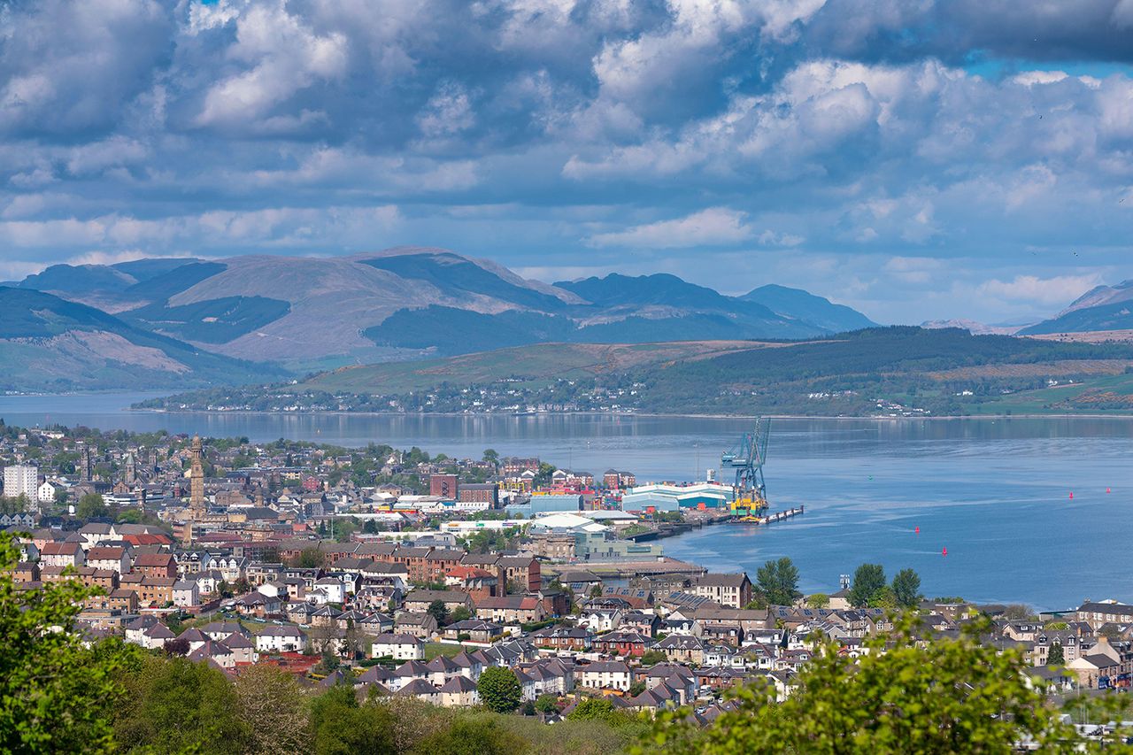 Elevated view of city of Greenock on coast of Firth of Clyde in Inverclyde, Scotland, UK Greenock on the coast of Firth in Clyde in Inverclyde, Scotland, UKCredit: Alamy