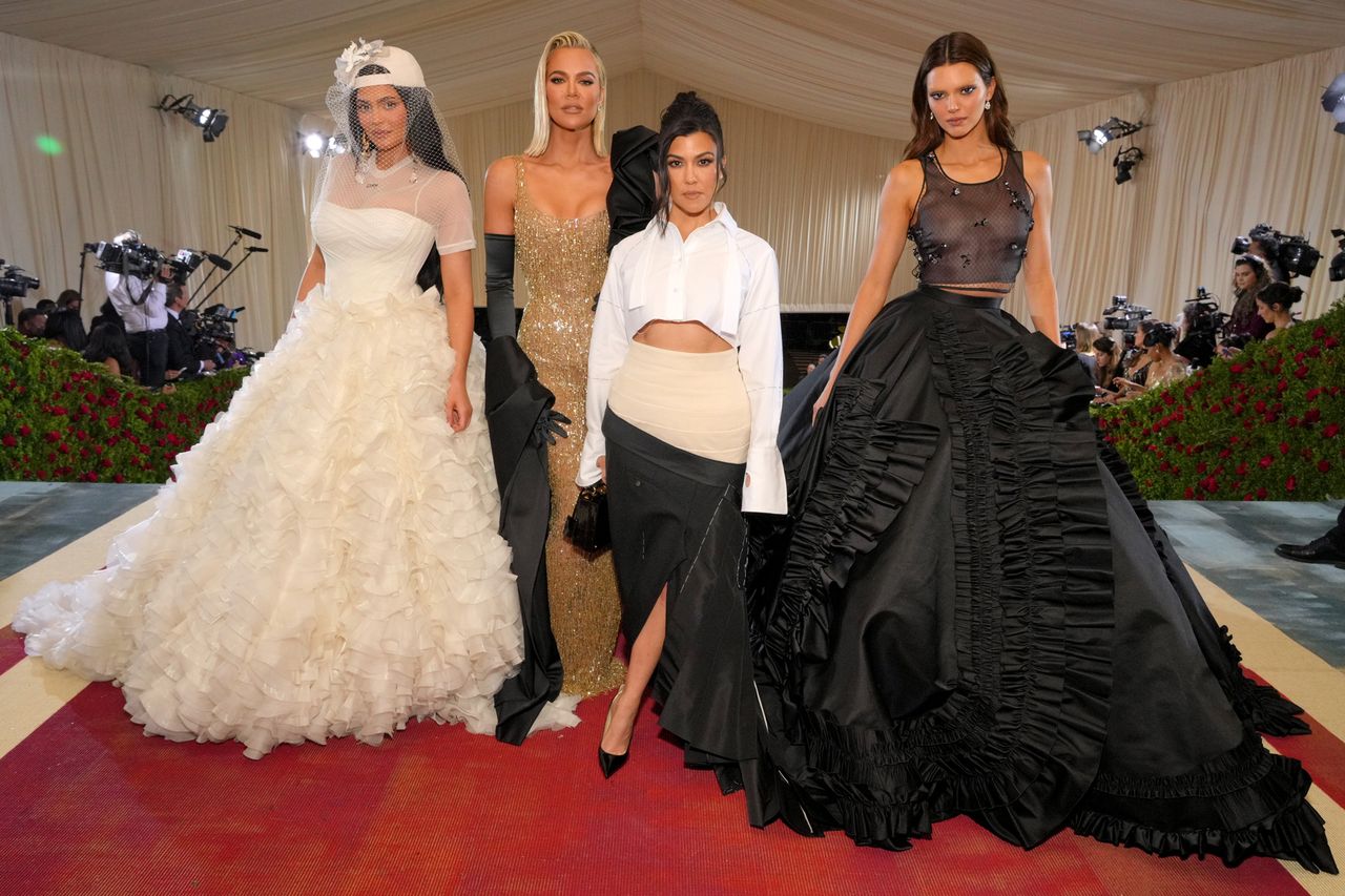 Kylie Jenner, Khloe Kardashian, Kourtney Kardashian and Kendall Jenner arrive at the 2022 Met Gala.Credit: Kevin Mazur/MG22/Getty
