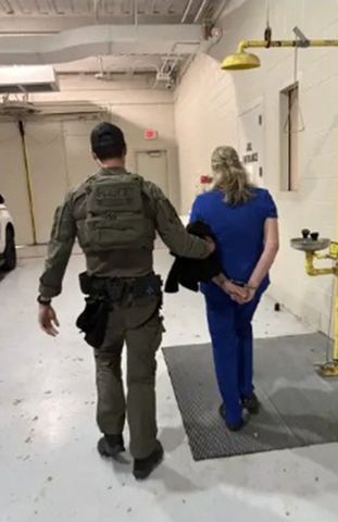Lisa Honrud being taken into custodyCredit: Frisco Police Department