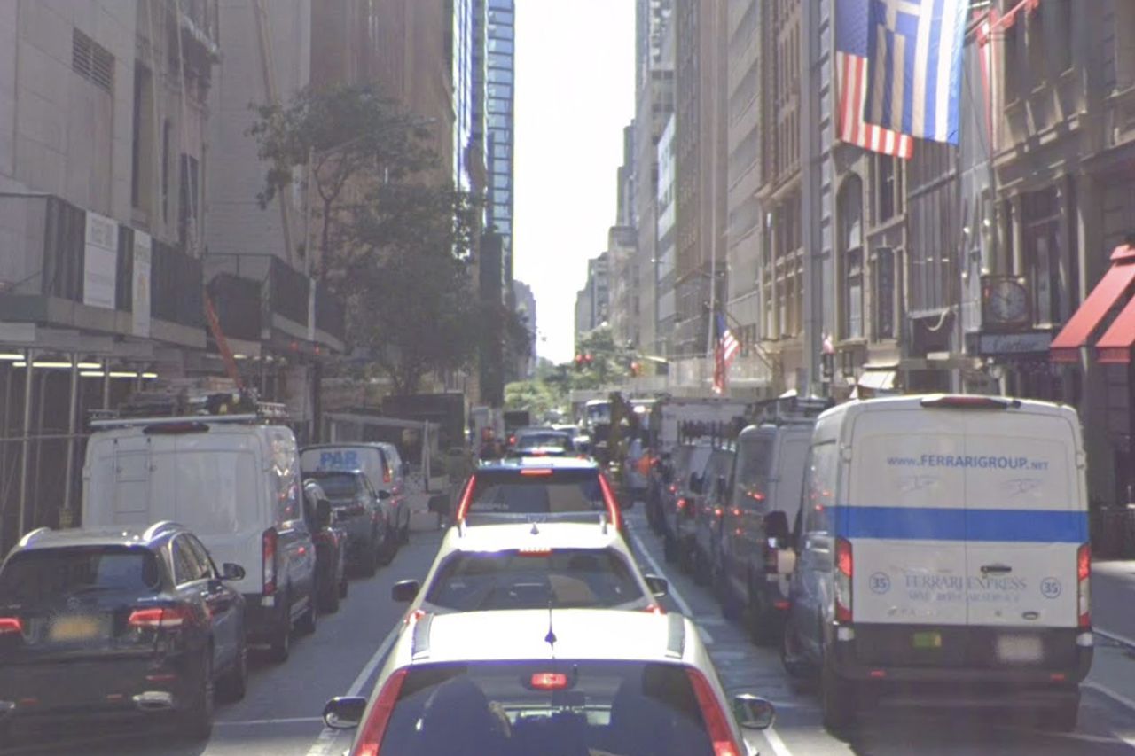Midtown Manhattan intersection of 52nd Street and Fifth Avenue, near flagship retail stores including Cartier and Nike, where a woman fell into an open manhole and later died from her injuries The intersection of 52nd Street and Fifth Avenue near the Cartier store.Credit: Google