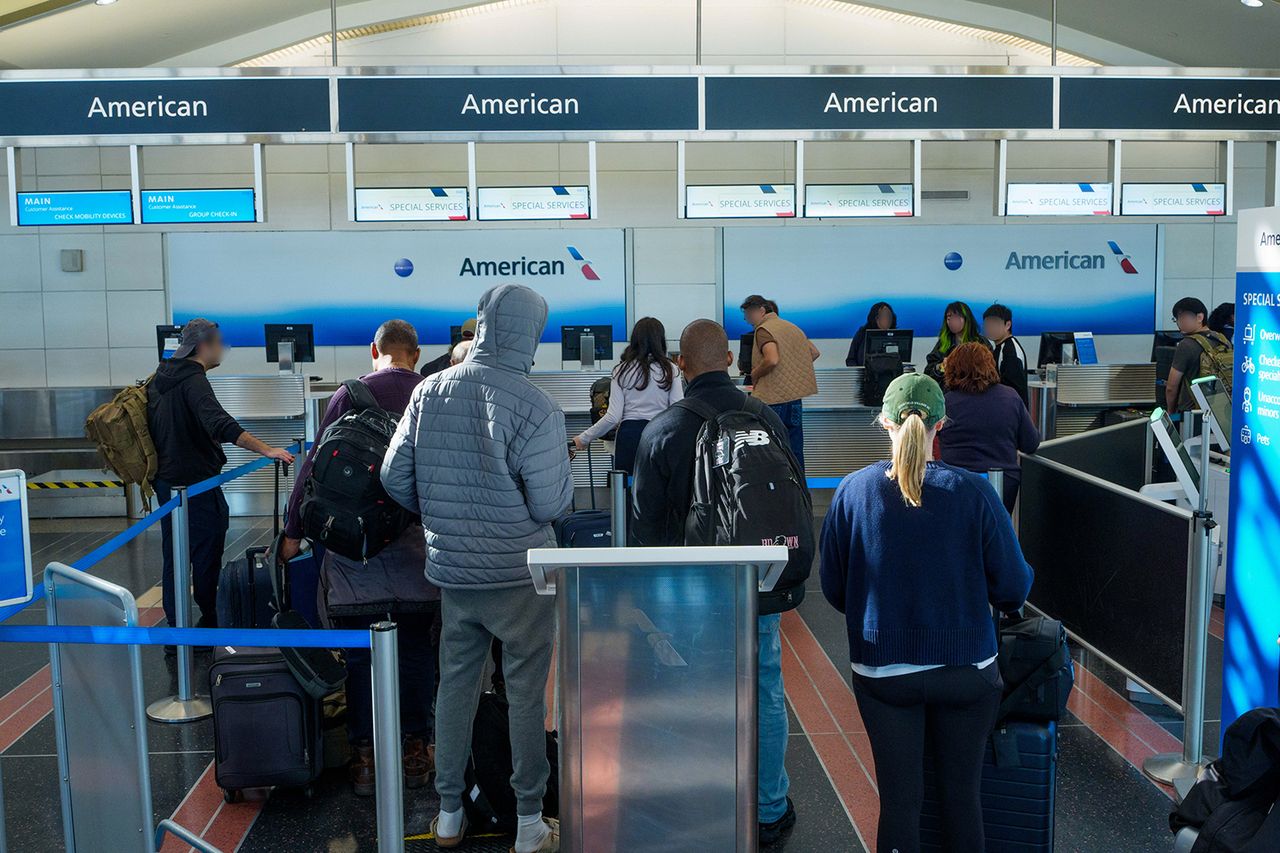 American Airlines check-in area at Ronald Reagan Washington National Airport in in Arlington, Va. on Nov. 26, 2025.Credit: Aaron Schwartz/Bloomberg via Getty