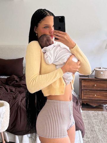 Nara Smith with one of her kids in her Mother's Day post.Credit: Nara Smith/Instagram