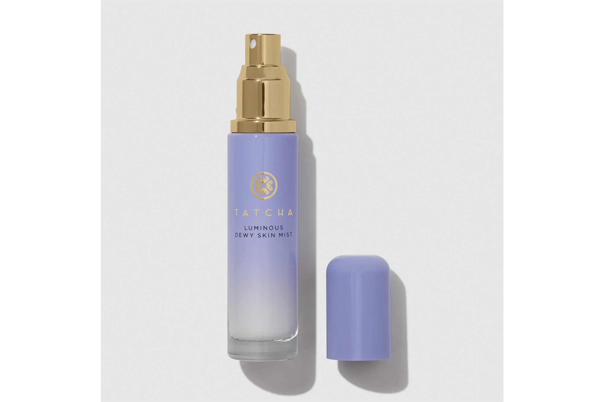 Tatcha Luminous Dewy Skin Mist bottle with its cap off.