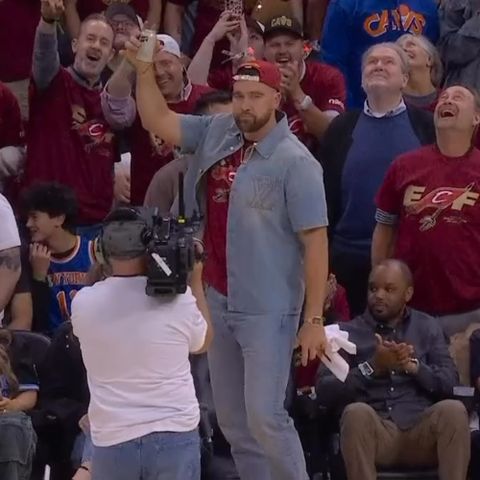 Travis Kelce chugs a beer at the Cleveland Cavaliers vs. New York Knicks game on May 23Credit: ESPN